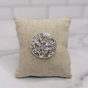 Silver plated floral disc brooch